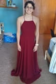 I bought this for my elopement ceremony in April! I have to get it hemmed, but I love it. The material is nice and heavy, and hopefully it'll keep me warm for my sunrise ceremony! The straps in the back are adjustable, which was very nice. - Ellen P.