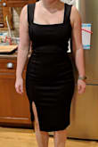 The material on this dress is a lot thicker and higher quality than I was expecting. It is not as strechy of a fabric as I thought, but I do love the quality and the design. As you can see from the pictures it fits a little too tight on me but is overall still pretty flattering. I took the picture after dinner, bloated from PMS, wearing no control panties or Spanx and I don't hate myself in it, quite the accomplishment! I was also wearing a full coverage bra which is why you see it peeking out the top. (I'm a 32G/H). My measurements are 38 - 29 - 38 for hips, waist, and chest. Honestly, although I feel like I do need to loose a little weight to make it look perfect I would still wear this with some control top undergarments as I am today. To the point that even though I'm not at my ideal weight, I want to buy it in the blue as well! - Carolina M.