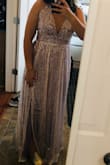 Love this dress so much!! It fits perfect and looks very fancy! It is super comfortable and looks so elegant! Truly fits to size and the only thing is the zipper is a little flimsy and hard to use. - Layla Q.