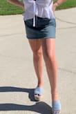 I'm so glad I ordered this skirt!! It is a tiny bit snug in the waist, but I wouldn't go up or down a size! I absolutely love the wash and frayed detailing! A must have!! - Sarah L.