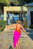 This is the perfect beach cover up. The colors are fantastic, the fabric is light, and it's exactly the right amount of sheer (just a little bit sheer). The straps are adjustable, which is great for someone who is quite petite. Only complaint is that even the smallest size is really long, so I have to tie up the end for the freedom to walk without tripping. - Stacey G.