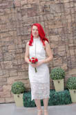 This was the perfect dress for our almost spur of the moment elopement. The minute I saw it, I knew I'd be getting married in this dress. I found it the slightest bit large in the chest, but it fit perfectly otherwise. I loved the way it looked and it was surprisingly comfortable. The lace along the neck kept flipping down into the collar, but otherwise I dont have any complaints. - Lisa J.