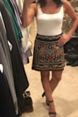 I absolutely love this fun skirt!! The colors are so dynamic yet classy on the black background. I bought it for a Mexican-themed night we will be attending on our vacation in May. The waist was a tiny loose which is great being high waisted it helps with movement and sitting. I think the XS would've felt uncomfortable. Plus we will be at a resort for a week eating and drinking... may need a tiny bit of extra room! Super comfortable. I can't say enough about how much I love this! - Judy K.