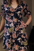 Love this dress! Fits a little looser, but the relaxed fix makes it so comfy. 
(Looks blue in the pictures but is a darker green) - Kristi F.