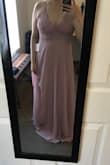 I'm really happy with this dress! I am wearing it for a friends wedding in June. It is too long on me so I will need to get it hemmed. I read another review that a girl added a slit to the dress and I may do the same. I usually wear a medium, but I went with a small for this dress and don't need to wear a bra with it. The adjustable straps are great.  Overall, great purchase for the price! - Megan P.