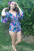 This romper is beyond cute. Gorgeous bright colors. The sleeves are really nice and the top is flattering, the bottom is a little short though but still so cute and worth buying. - Erika C.