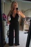 Very cute jumpsuit! Length covered my shoes but didn't drag the floor with 3 inch heels! Would purchase again! - Heather H.