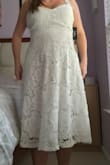I love love love the dress!! The straps are WAY too long, but a simple trip to get an alteration is no biggie! I can't wait to wear this dress for my bridal shower!!! - Kirsten G.