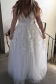 This dress is so high quality you'd think it came from a bridal shop. It fit me perfectly except for the straps which were a tiny bit too big, just a small alteration will fix that. It's a perfect dress for any time of year and looks beautiful in photos and in person. My family guessed I spent much more than I did. - Brenda H.