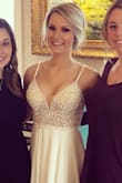 Wore this dress for my bridal shower and it was stunning! I had to have the straps altered, about 1 inch shorter because the back/bottom of the beading was a little loose. I hemmed about 2.5 inches from the bottom. I wore 2.5 inch heels and the hem was perfect even with the train but expensive. So many compliments on this dress. Very comfortable and light. - Jennifer K.