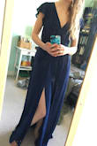 I usually wear a 2 or 4 in US sizes, S or XS. After reading the reviews I decided to order a XS and it fits pretty much perfectly. Honestly I don't think it needs any tailoring at all, the length might be a tiny bit long with flat shoes. I am planning on wearing it as a bridesmaid in a wedding in April. I can wear a normal bra and be super comfy in this dress!! The fabric was nicer than I expected, and I love the slit in the skirt! I think it can be dressed up or down. Simple, but flattering! - Kaleigh D.