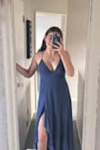 This dress arrived about 15 days after I ordered it. I live in New Zealand, so I think this is pretty good! I am 16 and bought this for my school ball in July. I love the dress and the colour so much. It's much lighter blue than I expected which is so nice. Its a bit tricky to put on, so you may need a hand! I love it so much and the customer service is amazing- even when we're on 2 different sides of the world! - Ruby D.