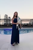 I love how the dress accentuated my body line. Love the flowiness of the dress. And last but not least is the most comfortable dress! Love how the navy is the right blue color!! - Denise T.