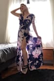 The dress is really cute and I love the fabric (be warned it's quite sheer in the sun), but if you have smaller bust I would say go a size down. Other than that I'm not mad at it. - Michaela E.