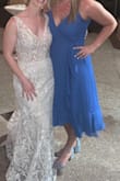 Beautiful dress! Took me a couple minutes to figure out how to put the darn thing on. It is a wrap dress and SUPER comfortable! I got so many compliments at the wedding I attended. - Hannah N.