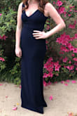 The straps were a little long so I had to get them taken in. The dress could be a half an inch longer in length so that I could wear a small Heel. Otherwise the dress was perfect! I loved the way it hugged my curves but was still loose enough to not feel suffocated. - Kmberly W.