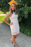 I bought this as a graduation dress and it's perfect! The dress itself is slightly stretchy and hits a little above my knee (I'm five foot five) I would recommend this to everyone!! - Melina M.