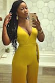 I didn't find the material to feel cheap at all. The material is thick and comfy, but the deep V neckline make for a less conservative and more sexier look. My only complaint would be the capri style length that I'm not a fan of. Overall I like it! - Dialen A.