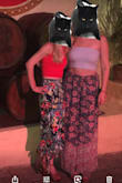 I wore these pants with a red crop-top for a vacation in Mexico. Since I am only 5'3, the pants were a few inches too long. I should have probably gotten them hemmed but because they arrived the day before I left for Mexico, and I was already planning on wearing wedges with the pants. The only problem was that the pants were a tad too long even with the wedges, so I decided to tie the ends of the legs to shorten them and go for a more "boho look." I think it was great. - Anita G.