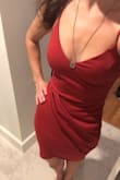 This dress is the perfect mix of cute and sexy. The color is gorgeous. It fits perfectly and the ruched front hides any tummy action going on. The material is of good quality and thick enough that I can get away with not wearing a bra. I'm in love with this dress and will probably order in more colors! - Allison B.