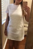 I ordered a large and it fits perfectly. It is just a little loose but not too loose that it looks messy/sloppy. - Lauren B.