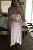 Great quality dress! I'm normally in between a small and medium size dress, but wrap dresses always have extra room. I got a small and it was a perfect fit even for a more busty girl. The material on the chest is a little thin, so I'll definitely have to wear some petals or something. The dress is a little long on me, but it looks more like a high low maxi dress on me.I don't have to get it hemmed! Overall would recommend. - Danica Z.