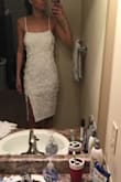 Love this dress. I said that it runs a little large, but honestly it's in a good way. This isn't a dress that you wear skin tight. It looks so classy in person and on pics. Can't wait to wear it for my shower. The length and slit is the perfect fit for me personally. Very happy with this purchase. - Kirsten P.