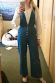 I am so pleased with this jumpsuit! Looks exactly like in the picture, a really pretty denim blue, and great for tall girls! The fabric feels good quality, and it's easy to wear it in warmer weather or colder- you can wear a T-shirt or a sweater under it (like in the photo). A great fashionable piece for your wardrobe that you can dress up or down. Super pleased! - Lyndall S.