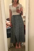 This skirt will be a great summer/spring staple. It's light weight, but not see through at all. I am typically a large in Lulus dresses (but a medium at other stores) so I went with a large and it fit perfect! There really isn't much stretch in the waist and there is zipper, the tie is just for looks. I am 6' tall so the dress doesn't hit the floor, but I didn't expect it too and planned for more a midi style. I paired with a crop top and it looks great! - Morgan C.