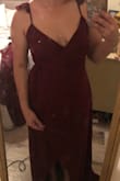 The dress is beautiful but the medium was way too big. I definitely recommend sizing down. - Jessica E.