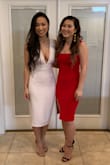 Very unique dress and the material is great quality. The top portion of the dress fits loosely but that's probably the only flaw in the dress. Besides that, it was a great purchase. - Kim T.