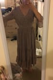 This dress is super pretty and classy! Love the shape and the print is very cute. I usually wear a small 4, but at Lulus I size up because most of the items don't hit me in quite the right places. I ordered a medium, but for this particular dress I ought to have gotten a small. I have plenty of room in the bodice, especially because of the back smocking.  I'm hoping I can still pull it off without it looking baggy because it was final sale. It also hits me right above my ankles, but I'm not as tall as the model. - Sarah F.