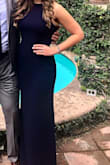 I wore this to a formal wedding in Mexico and Received many compliments. It was a bit long but worked with my 3.5" wedges. The material is thicker so it doesn't show anything you don't want showing. Very flattering. I highly recommend this dress. :) - Caroline S.