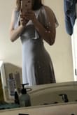 The material is super soft and supple. I got the grey one for a bridesmaids dress. Originally I purchased a medium but it was extremely large in the torso area so I reordered a small. Due to having a very short torso even the small is loose in the shoulder area but I can get it tailored. The waist area and hip area fits great for me otherwise! For someone with a regular sized torso I'm sure it would fit perfectly. - Olivia M.
