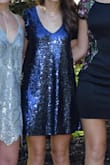 I LOVE THIS DRESS! I ordered this dress for my senior year homecoming. It came in a very timely manner. This dress looks great in photos and is very flattering. I was nervous that the sequins would be itchy, but it wasn't at all. The dress held up through the night and I didn't notice any sequins to be missing! Such great quality and definitely a fun and memorable dress for a school dance. - Ally D.