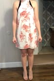 This dress is beautiful and looks exactly like the picture! It's a perfect length and looks great with the shoes I brought (don't mind the sports bra). - Maggie I.