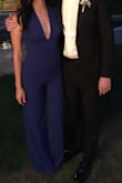 I wore this jumpsuit for a wedding, and it was perfect. SO comfortable! I'm a small B cup, sometimes an A cup, and it actually made my chest look so good - usually deep v-necks don't! I wore it with heels, and I'm not very tall, but I didn't find the need to hem it. Although it did touch the ground, I didn't feel like I was tripping or anything. I got compliments all night, the bright blue stood out without being inappropriate for a formal event. My only complaint is I wish it was not elastic in the back and a zipper instead - I feel like the elastic makes the jumpsuit look cheap and it the fabric isn't as smooth back there. But other than that I have no complaints, especially for the price! - Ashley T.