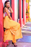 You can't beat the movement of this skirt. The color is so vibrant. You can also peep the leg through, which is awesome. - Sierra S.