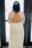 I went through a ton of reviews to make sure that I can get the right fit for the dress! I always struggle with dress sizes, usually I'm in between sizes. This dress was gorgeous!! The lace wasn't as delicate as I thought it would be, which I loved. I originally ordered an XL based on the size chart and other reviews. When I received it, the dress fit perfectly at the waist, but the arms and length of the dress was way too long! So I ordered a L and the arm length was just long enough that it didn't need to be altered, it wasn't skin tight on me, which I also preferred, and the leg length was the length that I'm used to with buying long dresses. (I've perfected the kick and step method to avoid having to alter dresses). The waist was just slightly too snug, but the nice thing about the way this dress flowed was that it didn't feel like I wouldn't be able to move or breathe because of it! I ended up going with the L for my elopement. It was this past February, in the middle of a snowy winter, so I had to buy a faux fur shawl to go over it, but this dress is exactly what I was looking for! - Kristien K.