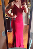 Bought this for a bridesmaid dress. I love how long it is. I can wear flats or heels and it still touches the floor. It does hug your shape. I have a small waist and a big butt. I always worry about dresses not being flattering but this one is! - Samantha J.