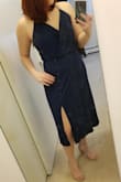 I'm happy with this dress. I probably could of went with a medium, but I like that it's not skin tight. I cant wait to wear this to a wedding next month. - Liane G.