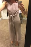 Very pretty romper! The legs are a bit wide (maybe that's just the style?), but the top fits well. I am usually a size 0-2 for dresses and ordered a XS and it fits pretty good, maybe a bit loose yet. Love the mauve color - will be perfect at my bridal shower. - Cynthia R.