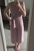 This is so cute! I cannot wait to wear it! I originally ordered a size small, but returned it for an xs because the fit was a little big for my waist and chest. So happy with it! Definitely would recommend! - Kassie B.