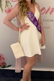 The material is stretchy, there is a great slip underneath and the material is thick. I did wear a bra but you don't have to if you don't want to. - Kaitlyn B.