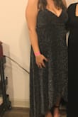 This dress is beautiful and very flattering on a curvy woman. The material is heavy, but the wrap is nice because you can tie it tighter to fit your shape. Definitely would recommend! - Ashley G.