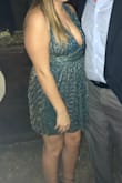 I ordered this dress for a fraternity formal. Definitely shows a lot of cleavage for a large chested woman. I ended up having to twist the straps right in the back to have a good fit. Material is shimmery and perfect for holiday cocktail events! - Ashley G.