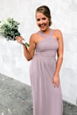 I wore this to a recent wedding with all the other bridesmaids, and it fit all of us so well! It's a very flattering cut, and I felt gorgeous in the color. 10/10 would recommend! - Niki C.