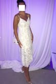Absolutely fabulous dress! Is easy to wear, no need for bra, just adjust the straps. It's very comfortable, flattering and light. I had a special white party and it was perfect! I received tons and tons of compliments. Highly recommend! - Liz S.