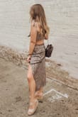 This skirt is very cute and the quality is great! I do have to say that it does run a little bit big and I could've gotten it a size down! - Trisha S.