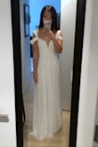 I ordered both the XS and the XXS and the XXS fits perfectly!! It's a beautiful dress and I might wear it for my wedding reception. The quality is excellent. I'm petite so I'd need to get it hemmed but that's it. - Wendan L.